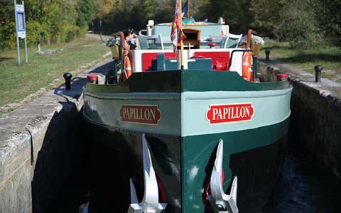 Papillion barge in canal