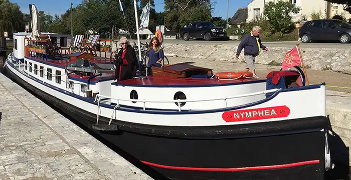 Barge Nymphea transiting a lock